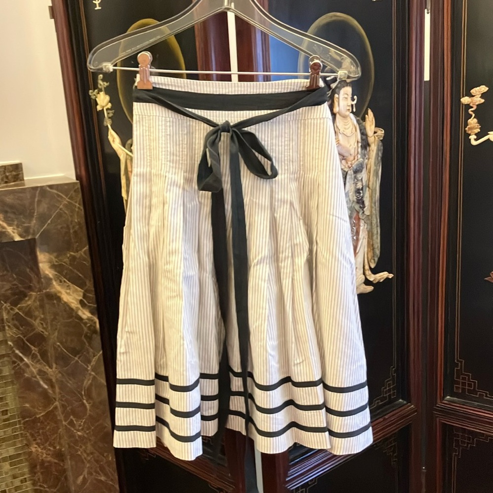 PAUW Cream and White Knee-Length A-Line pleaded Skirt with Tie Front